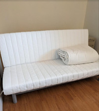 Ikea Queen size Sleeper Sofa. Includes additional Cover.