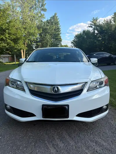 Clean, low-km 2014 Acura ILX in white with black leather interior. Runs perfectly and has been very...