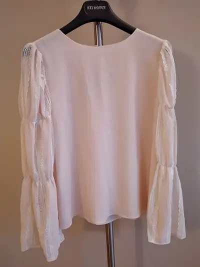 New with tag Size S Color light beige champagne Beautiful lace accent on the sleeves Armpit to armpi...