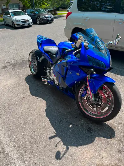 Cbr 600rr stretched with one sided swing arm 330 tire Custom subzero paint job Bike runs good If you...
