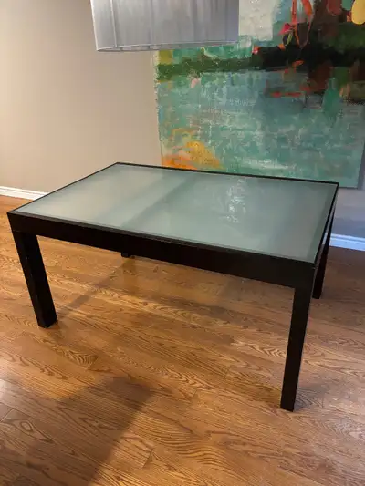 Table measures 60” x 40” with hideaway extension (36” x 38”) Table fully extended measures 96” Seats...