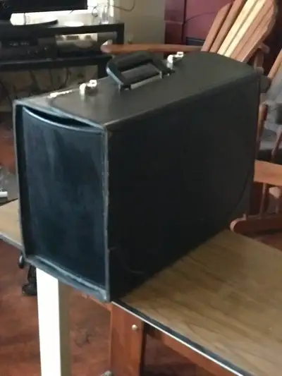 Vintage Briefcase with combination locks. In great working condition.