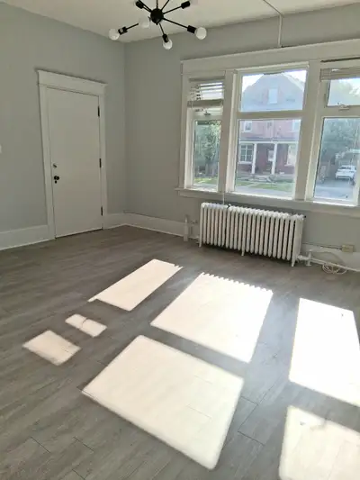 Huge main floor unit with high ceilings in quiet triplex. Utilities included. Shared fenced yard, fr...