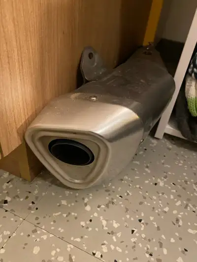 Selling a used motorcycle exhaust system, perfect for enhancing your bike's performance and sound. A...