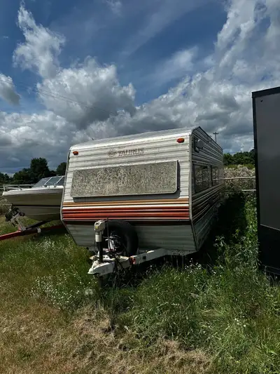 Could be fixed up and good for someone getting into camping pulls straight needs some love or turn i...