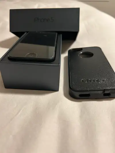 iPhone 5 16GB Black. Includes original box and Otterbox Case.
