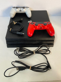 PS4 PRO console + 2 controllers + cables 