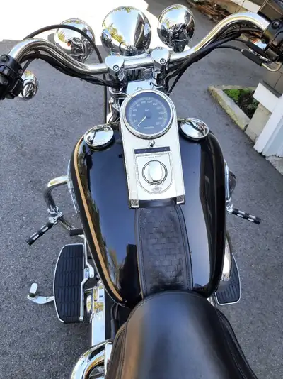 For sale 2003 hundredth anniversary edition springer softail heritage 48,500 km I have original pipe...