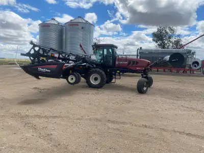 Selling a 2014 MacDon M205 self-propelled windrower with a 40’ D60-S draper header. This unit is fie...