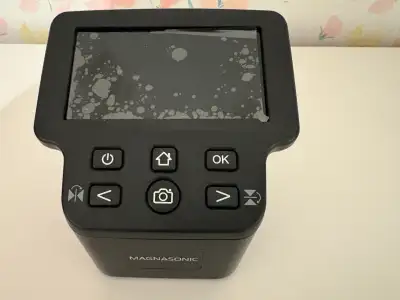 Magnasonic All in One Film and Slide Scanner 22 MP. Can do slides, negatives, super 8. Barely used.