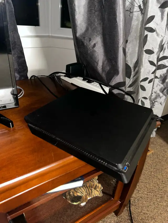 Sony playstation 4 , with a charger62864362175363123