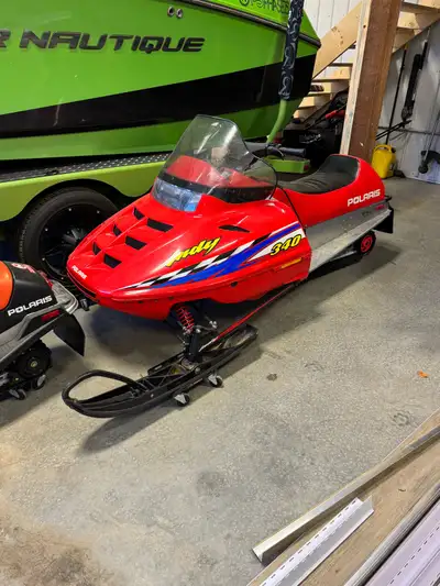 I'm selling a used Polaris Indy 340 snowmobile, known for its reliability and fun on the trails. Thi...