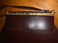Genuine leather Tarkor purse made in 1960. Gold clasp.