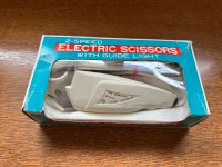 Electric Scissors Sun Scissors 2-Speed with Guide Light, in orig