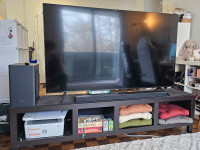 Samsung 65 inch tu8000 with the shelf and the sound bar