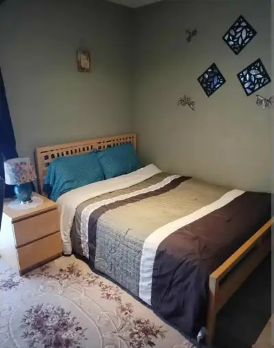 The large room is on the main floor of a beautiful townhouse in a quiet neighborhood, not in a basem...