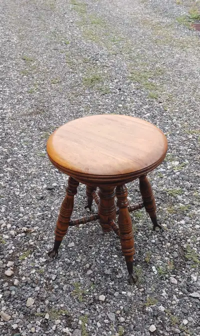 Antique piano stool with claw and glass ball feet, View more