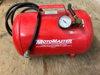 Offering a used MotoMaster 5-gallon portable air tank, perfect for various inflation needs, from tir...