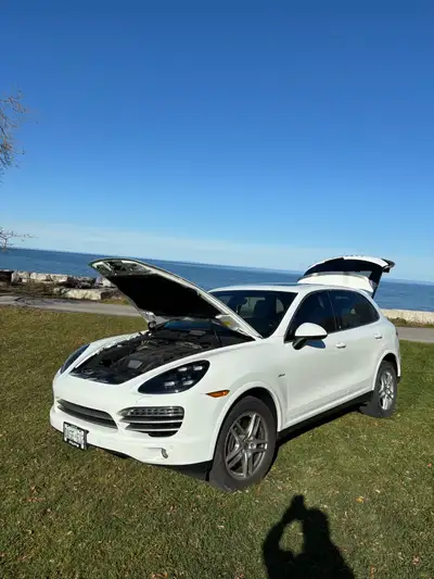 150,000 kms Accident free Platinum Two sets of Porsche rims Winter and summers Tan interior