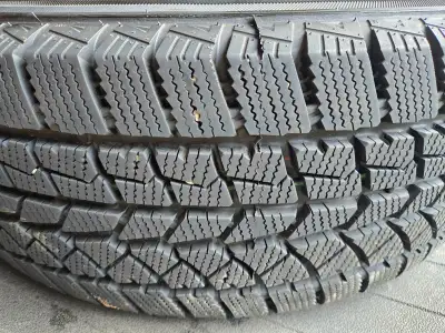 Winter tires with steel rims and sensors. Winter tires, sized 235/65R17, come mounted on durable ste...