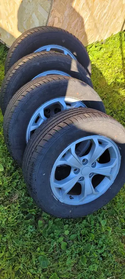 Tires and alloy rims 215/60/16 rim bolt pattern is 114.3 x5 hole 300$ firm tires have excellent thre...
