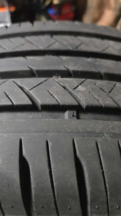 Set of 4 Used all season tires for a smaller sedan/car 205 60 R15 91H - on rims