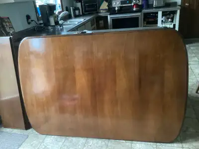 Beautiful heavy table, pedestal legs, three additional leafs to make larger, heavy buffet, a little...