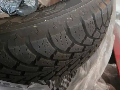 Set of 4 Goodyear tires on rims specification 225/60R17 99S, used only a few months in one winter se...