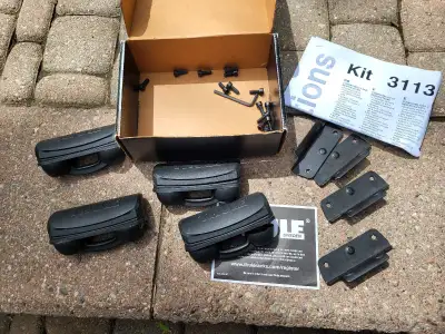 Selling nearly new Thule 3113 fit kit designed for truck cap, hard topper etc Complete in original b...