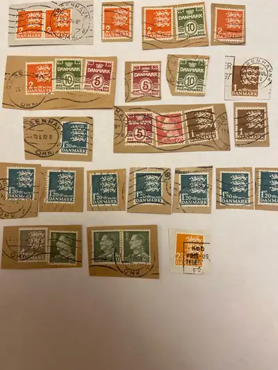 Je vends un ensemble de timbres danois usagés, chacun avec son propre charme et histoire. Ces timbre...