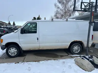 2007 Ford Van converted to Camper Van. 250,000 km's--runs great. Fully insulated, wood paneled, wind...