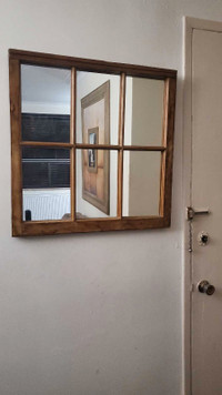 Mirror inside a window frame