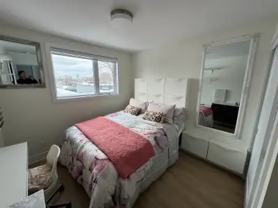 This beautifully furnished bright room is located in a two story home and has access to its own balc...