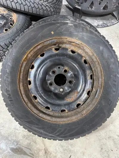 Snow tires on rims 215/60/16 with bolt pattern 5x114.3. 2 tires are Goodyear and 2 tires are newer c...