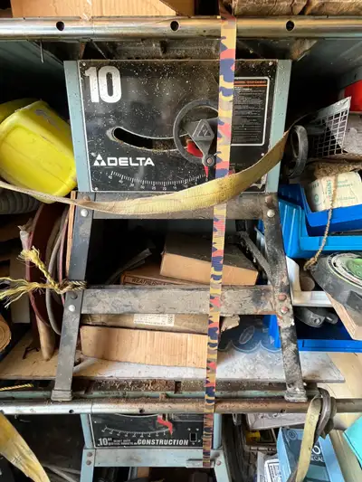 See pictures of the front of the saw The parts saw is sitting upside down on top of it It is in stor...