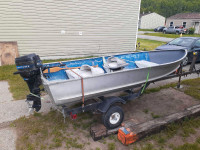 14ft alum boat 20hp motor and trailer