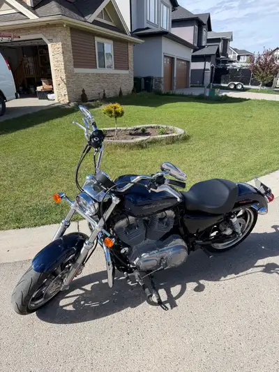 2013 Harley Davidson XL883L (Iron 883) in excellent condition with only 4,264 kms. Bike has been gar...
