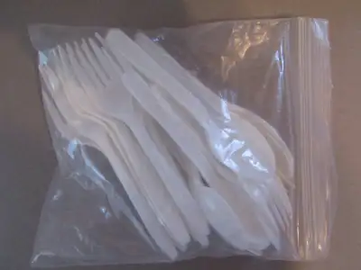 bag full of plastic forks and spoons (unused), View more
