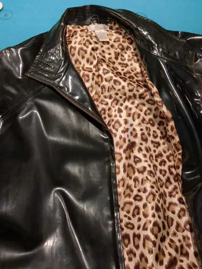 Black raincoat with leopard lining, View more