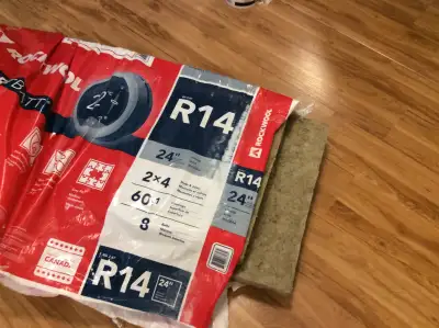 insulation bats left over from small job at home. rock wool bats, 2 pieces for 2x4 wall, 24 inch cen...