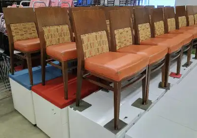 In good condition. Wood frame, fabric back, vinyl seat. Seats measure approximately 18.5" across the...