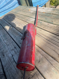 Antique pesticide tool.