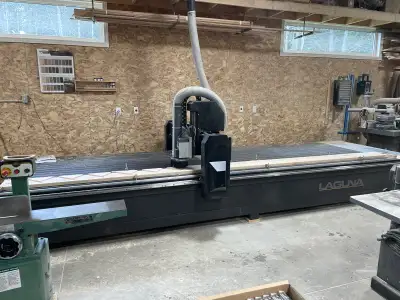 Like new single phase Laguna CNC with large 5’x16’ T-slot table. This CNC was ordered in 2021, and h...