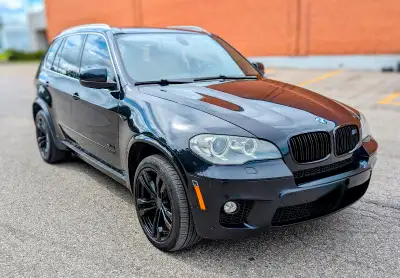 Own a piece of luxury and performance with this 2013 BMW X5 50i. This SUV combines power and eleganc...
