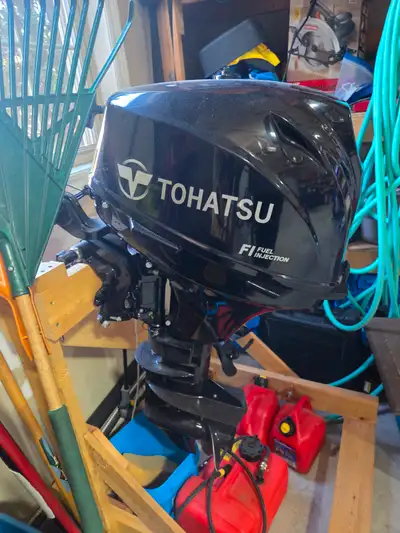 PRICE REDUCED Tohatsu 15 hp 4-Stroke Fuel Injected. Short Shaft with fuel tank used only for a few h...