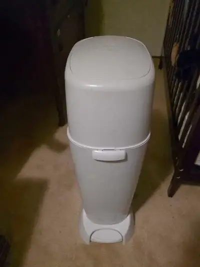 Diaper Genie. Does not come with bags but has a few of the filters left. I only used 1.