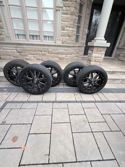These are a set of four high-quality, pre-owned Fuel off-road wheels paired with General Grabber HTS...