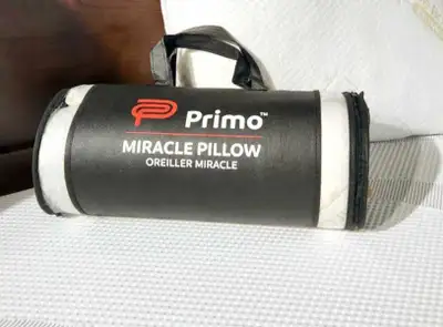 Miracle Pillow features mix of shredded memory foam and shredded polyfoam to cradle your head and ne...