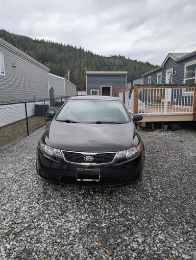 Kia Forte as a driving school car, its reliability, fuel efficiency, low cost, compact size for city...