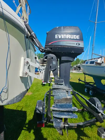 A long shaft outboard. The engine was running on the stand last week. 8hp includes tank and hose. pi...